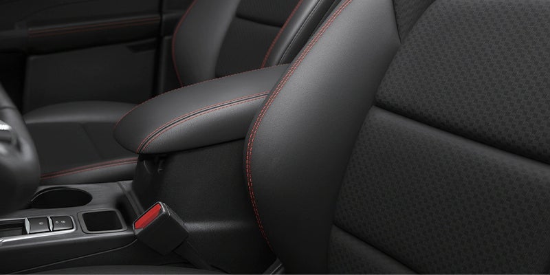 Close-up of black and red-stitched seat in the Ford Escape