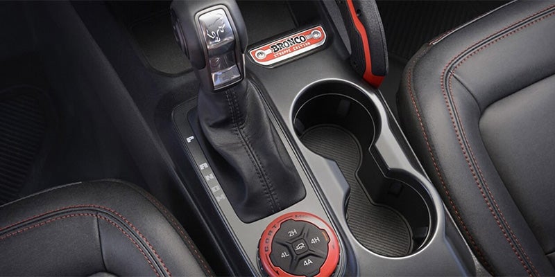 Bronco’s center console with gear shift and cup holders